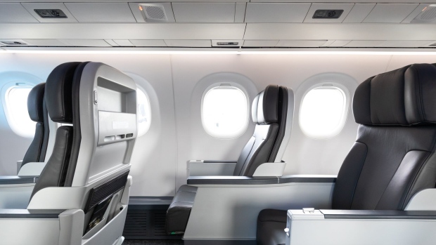 The business class interior of an Embraer SA 195-E2 aircraft is displayed during the Singapore Airshow at the Changi Exhibition Centre in Singapore.