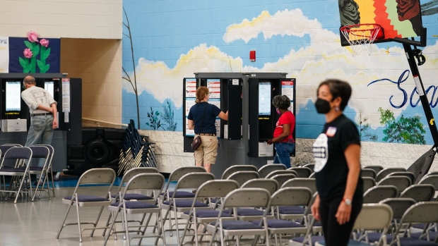 Voters cast ballots at a polling location in Atlanta, Georgia, US, on Tuesday, May 24, 2022. The latest test of Donald Trump's sway over Republican voters will be on display Tuesday night in Georgia's crucial primary race.