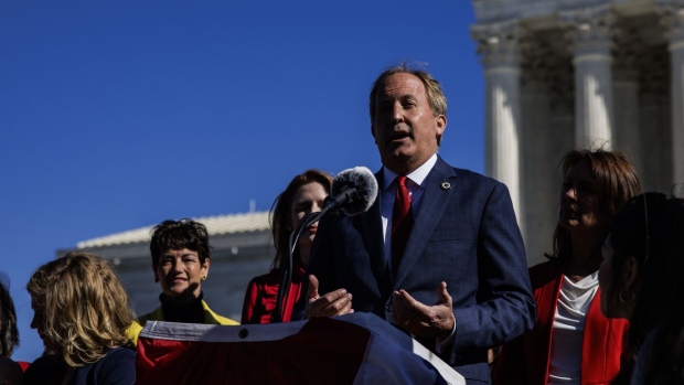 Ken Paxton, Texas attorney general, speaks outside the U.S. Supreme Court in Washington, D.C., U.S., on Monday, Nov. 1, 2021. The Texas abortion clash goes before the court today, with providers and the Biden administration trying to cut through a procedural haze to block a law that has largely shut down the practice in the country's second-largest state.