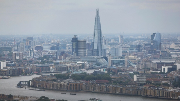 The Shard skyscraper, center, and the City of London skyline in London, U.K., on Wednesday, Sept. 1, 2021. The pandemic has weakened the gravitational pull of city centers, with new forces now reshaping knowledge-based economies. Photographer: Hollie Adams/Bloomberg