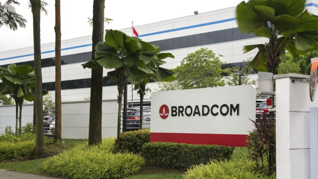 The Broadcom Ltd. logo is displayed outside the company's headquarters in Singapore, on Tuesday, Nov. 7, 2017. Broadcom Chief Executive Officer Hock Tan is gearing up for what could be a lengthy and bruising hostile takeover battle to clinch his $105 billion offer for Qualcomm Inc., the largest-ever tech deal.
