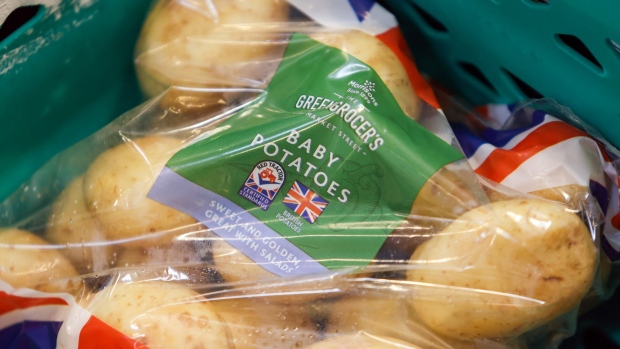 A bag of baby potatoes in a Morrisons supermarket, operated by Wm Morrison Supermarkets Plc, in Saint Ives, U.K., on Monday, July 5, 2021. Apollo Global Management Inc. said Monday it's considering an offer for Morrison, heating up a takeover battle for the U.K. grocer. Photographer: Chris Ratcliffe/Bloomberg