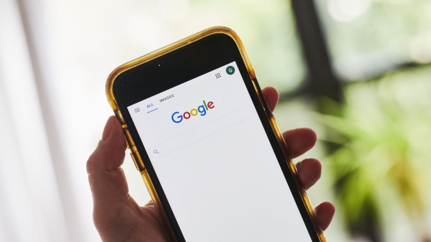 The Alphabet Inc. Google search page is displayed on a smartphone in an arranged photograph taken in the Brooklyn Borough of New York, U.S., on Friday, July 24, 2020. Alphabet Inc. is scheduled to release earnings figures on July 30. Photographer: Gabby Jones/Bloomberg