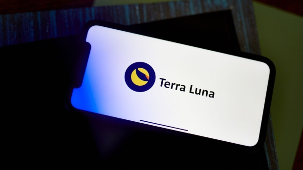 The Terra Luna stablecoin logo on a smartphone arranged in the Brooklyn borough of New York, US, on Monday, May 16, 2022. The collapse of the Terra ecosystem, and the tokens Luna and UST, will go down as one of the most painful and devastating chapters in crypto history.