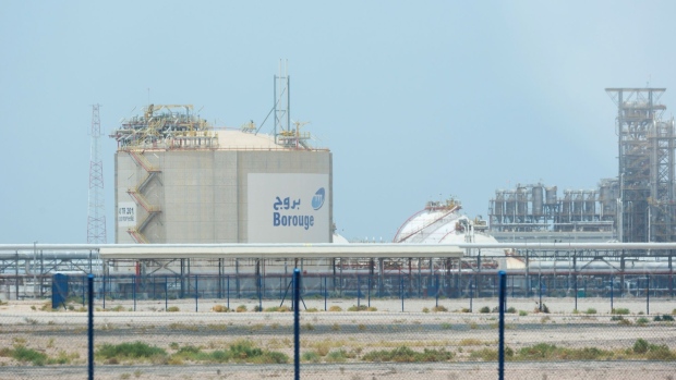 A sign sits on display at the Borouge 3 petrochemical plant, at the Ruwais refinery and petrochemical complex, operated by Abu Dhabi National Oil Co. (ADNOC), in Al Ruwais, United Arab Emirates, on Monday, May 14, 2018. Adnoc�is seeking to create world�s largest integrated refinery and petrochemical complex at Ruwais. Photographer: Christophe�Viseux/Bloomberg