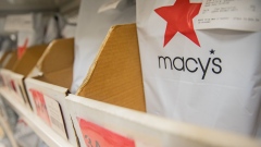 Packages at the Macy's flagship store in New York, U.S., on Thursday, Jan. 6, 2022. Macy's Inc. is transforming the world's largest department store to optimize its omnichannel strategy. Photographer: Jeenah Moon/Bloomberg