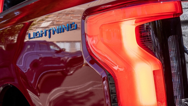 A tail light of a Ford Lightning F-150 pickup truck during a media event in Santa Rosa, California, US, on Friday, May 20, 2022. With the release of the F-150 Lightning, Ford hopes to electrify new and traditional truck buyers alike, and eventually to replace its industry-defining gas-powered line.