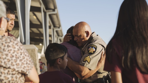 A Texas state trooper outside Robb Elementary School in Uvalde, Texas, US, on Tuesday, May 24, 2022. Fourteen students and one teacher were killed during a massacre in a Texas elementary school, the deadliest US school shooting in more than four years.