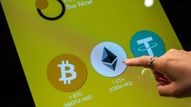 The logos of Bitcoin, left, Ethereum, center, and Tether on a cryptocurrency automated teller machine (ATM) at a CoinUnited cryptocurrency exchange in Hong Kong, China, on Friday, March 4, 2022. Bitcoin fell below $38,000 on March 8, touching its lowest price in a week, as global markets tumbled on concerns that spiraling commodities prices unleashed by Russia's invasion of Ukraine may have a wider and longer-lasting impact than previously thought.