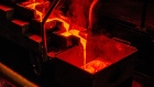 Liquid gold flows from a furnace into individual casting molds to create 28 kilogram gold bars in the foundry at the South Deep gold mine, operated by Gold Fields Ltd., in Westonaria, South Africa, on Thursday, March 9, 2017. South Deep is the world's largest gold deposit after Grasberg in Indonesia, makes up 60 percent of the company's reserves and the miner says it's capable of producing for 70 years.
