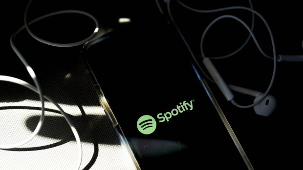 The Spotify logo on a smartphone.