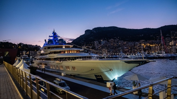 The luxury superyacht Amadea, manufactured by Luerssen Verwaltungs GmbH, sits moored in the harbor at night ahead of the Monaco Yacht Show (MYS) in Port Hercules, Monaco, on Tuesday, Sept. 24, 2019. The MYS features 125 luxury superyachts and runs from Sept. 25 - 28.