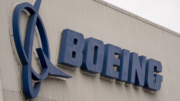 Signage at the Boeing Co. manufacturing facility in Renton, Washington, U.S., on Monday, March 21, 2022. China Eastern Airlines will ground all of its Boeing 737-800 jets starting Tuesday after a plane crash in the southwestern Chinese region of Guangxi. Photographer: Bloomberg/Bloomberg