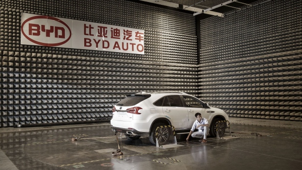 A vehicle sits in an electro-magnetic interference testing lab at the BYD Co. headquarters in Shenzhen, China, on Thursday, Sept. 21, 2017. China will likely order an end to sales of all polluting vehicles by 2030, BYD's Chairman Wang Chuanfu predicted, spurring the nation's leading maker of electric cars to consider supplying batteries to competitors during the powertrain transformation. Photographer: Qilai Shen/Bloomberg