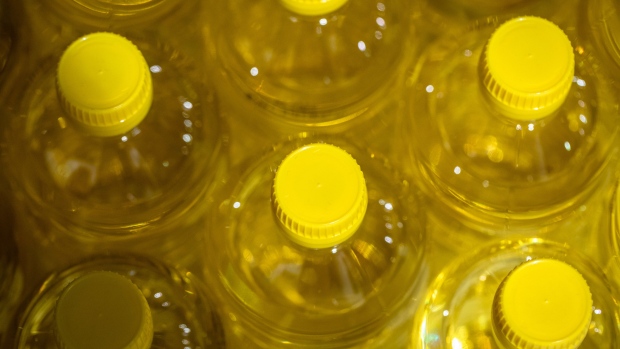 Bottles of sunflower oil on display inside a supermarket in Barcelona, Spain, on Wednesday, April 27, 2022. Access to edible oils for making food and biofuels is at risk as war in Ukraine and weather-driven supply woes crimp supplies and trade flows. Photographer: Angel Garcia/Bloomberg