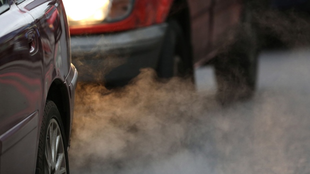 PUTNEY, ENGLAND - JANUARY 10: Exhaust fumes from a car in Putney High Street on January 10, 2013 in Putney, England. Local media are reporting local environmental campaigners claims that levels of traffic pollutants, mostly nitrogen dioxide, have breached upper safe limits in the busy street in south west London. (Photo by Peter Macdiarmid/Getty Images) Photographer: Peter Macdiarmid/Getty Images Europe
