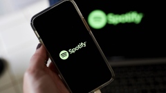 The Spotify logo on a smartphone arranged in Saint Thomas, U.S. Virgin Islands, on Saturday, Jan. 29, 2022. Spotify Technology SA outlined steps it will take to halt the spread of misleading information about Covid-19 on its audio-streaming service in an attempt to quell a growing controversy over its support for the podcast host Joe Rogan.