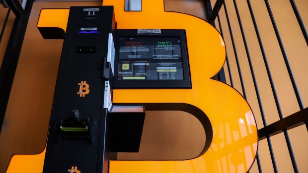 A security cage protects the automated teller machine of a cryptocurrency kiosk in Antwerp, Belgium.