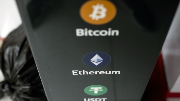 The logos of Bitcoin, left, Ethereum, center, and Tether on a cryptocurrency automated teller machine (ATM) at a CoinUnited cryptocurrency exchange in Hong Kong, China, on Friday, March 4, 2022. Bitcoin fell below $38,000 on March 8, touching its lowest price in a week, as global markets tumbled on concerns that spiraling commodities prices unleashed by Russia's invasion of Ukraine may have a wider and longer-lasting impact than previously thought. Photographer: Paul Yeung/Bloomberg