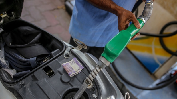 An attendant fills a motorbike with fuel at a Bharat Petroleum Corp. gas station in Hyderabad, India, on Wednesday, March 23, 2022. India’s urban consumption is driving recovery from late pandemic wave but has further intensified the divergence between cities and the hinterland, according to a report by Citigroup Inc released last week.