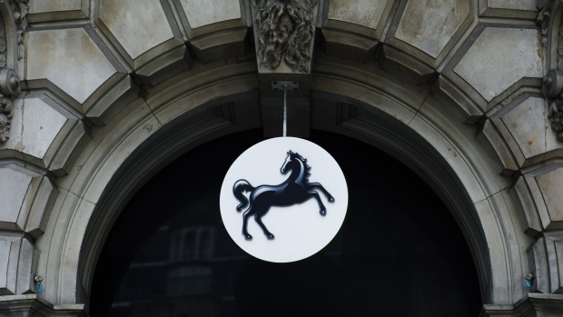 A sign above the entrance to a Lloyds Banking Group Plc bank branch in London, U.K., on Friday, Oct. 22, 2021. The leaders of Europe's top banks agree they have a lot riding on the recent surge in consumer prices. Photographer: Luke MacGregor/Bloomberg