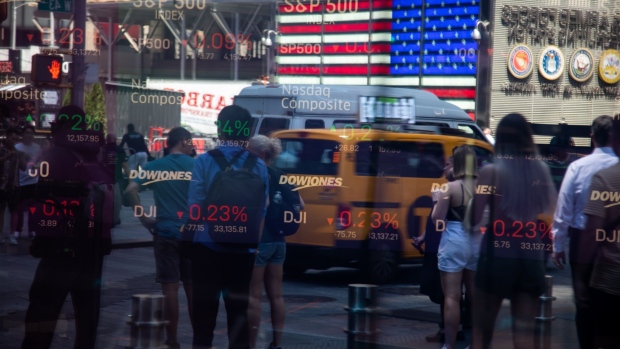 Stock information in a window of the Nasdaq MarketSite in New York, US, on Tuesday, May 31, 2022. The S&P 500 defied bear market status just over a week ago and is set to finish May roughly where it started. Photographer: Michael Nagle/Bloomberg