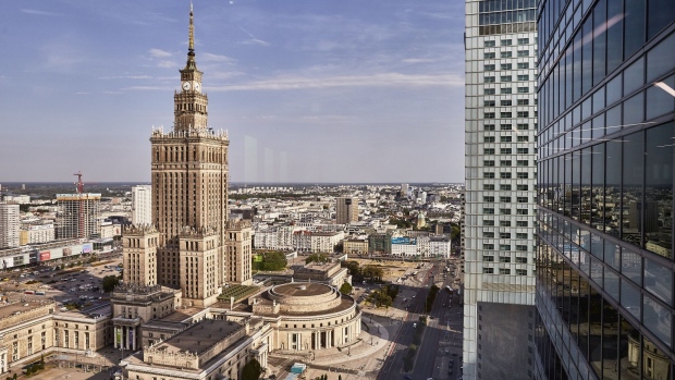 The Palace of Science and Culture, left, stands on the city skyline in Warsaw, Poland, on Monday, July 1, 2019. Poland's authorities put on a brave face as U.S. President Donald Trump called off a visit to Warsaw to commemorate the start of World War II because a big storm on the Atlantic was heading toward Florida.
