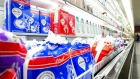 Milk bags are shown on store shelves