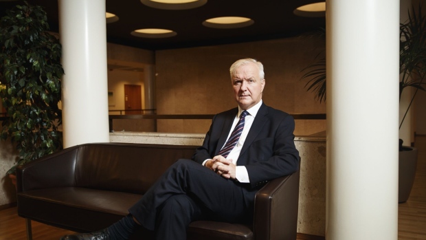 Olli Rehn, governor of the Bank of Finland, poses for a photograph following a Bloomberg Television interview at the central bank in Helsinki, Finland, on Thursday, Oct. 10, 2019. Rehn, who is also a member of the governing council of the European Central Bank, said a report by the Financial Times on Thursday stating ECB President Mario Draghi ignored advice from monetary policy committee against resuming quantitative easing is "greatly exaggerated."