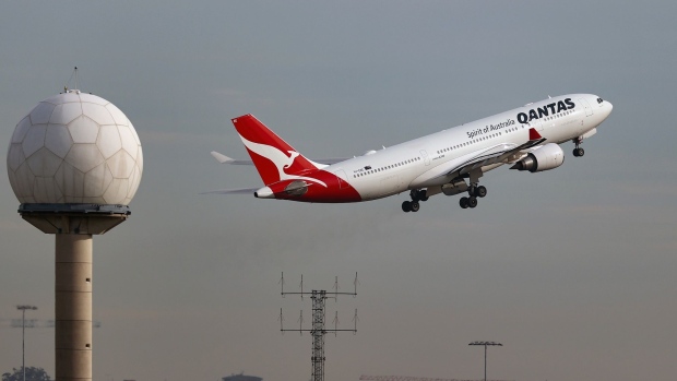 An Airbus SE A330-202 aircraft operated by Qantas Airways Ltd. takes off from Sydney Airport in Sydney, Australia, on Wednesday, June 23, 2021. While losses at airlines globally from Covid-19 are set to surpass $174 billion by the end of 2021 -- wiping out half a decade of profits -- Qantas has become one of the most financially secure carriers anywhere in the world.