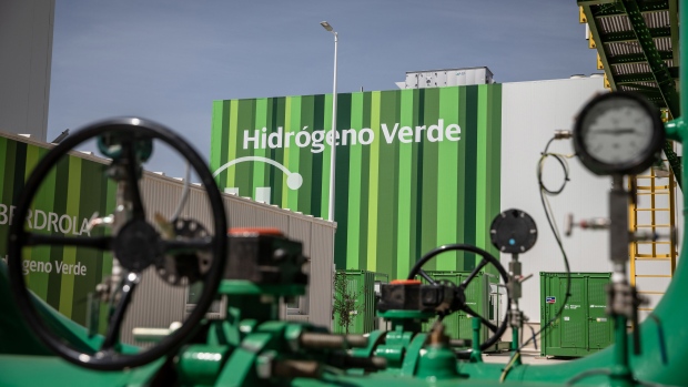Hydrogen storage tanks and the electricity substation during the final stages of construction at Iberdrola SA's Puertollano plant in Spain. Photographer: Angel Garcia/Bloomberg