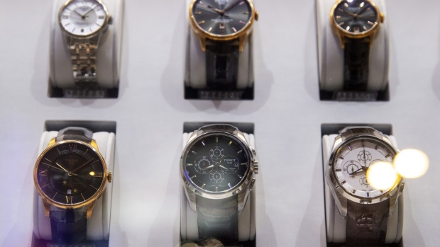 Tissot SA watches are displayed in a store window in the Causeway Bay district of Hong Kong, China, on Thursday, Aug. 29, 2019. Whether it's glitzy shops in Central or decades-old family businesses along the city's winding streets, retailers of all levels across Hong Kong these days find themselves struggling in much the same way. Photographer: Chan Long Hei/Bloomberg