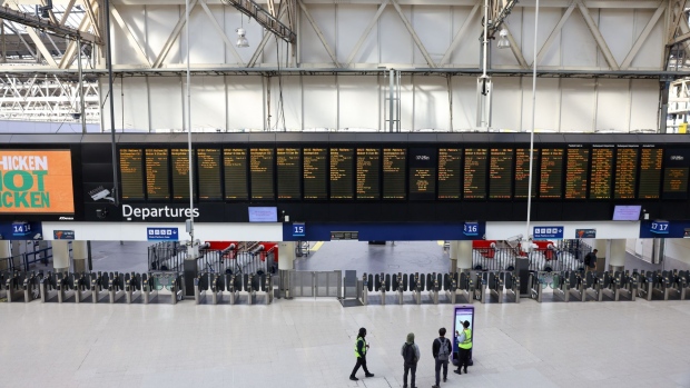 A near empty concourse, during a rail workers strike, at London Waterloo railway station in London, UK, on Tuesday, June 21, 2022. UK rail workers began Britain's biggest rail strike in three decades on Tuesday after unions rejected a last-minute offer from train companies, bringing services nationwide to a near standstill. Photographer: Hollie Adams/Bloomberg