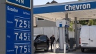 A customer refuels at a Chevron gas station in Menlo Park, California, US, on Tuesday, May 24, 2022. The price of a regular gallon of gas is more than $4 in all 50 states for the first time, while in California, drivers are paying an average $6.07 per gallon to fill up their car.