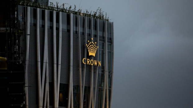The Crown Resorts Ltd. logo at the Crown Sydney hotel resort and the One Barangaroo Crown residences in Sydney, Australia, on Tuesday, Feb. 16, 2021. The crisis enveloping Crown deepened after a state regulator recommended an inquiry into the company’s fitness to run its Perth casino hours after the company was formally found unsuitable to operate a Sydney casino.