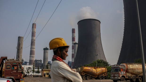 Cooling towers at the coal-fired NTPC Simhadri thermal power plant in Andhra Pradesh, India. Photographer: Dhiraj Singh/Bloomberg