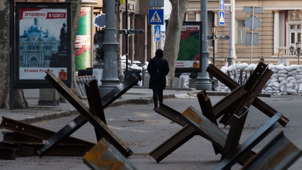 Anti-tank obstacles line a deserted street in the center of Odesa, Ukraine, on Friday, March 18, 2022. While Russian landing craft have gathered off Odesa's Black Sea coast several times over the last two weeks as if to attack, a sea landing would be difficult and suitable beaches have been mined and are defended.