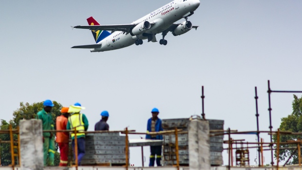 A South African Airlines jet takes off in Johannesburg. Photographer: Waldo Swiegers/Bloomberg
