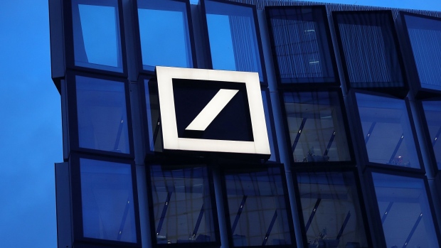 The Deutsche Bank AG logo sits on the bank's campus office building in Frankfurt, Germany, on Thursday, Jan. 31, 2019. On the eve of fourth-quarter results that are likely to reflect its troubles, Deutsche Bank AG’s ability to avoid a government-brokered merger with Commerzbank could rest on its performance in the first quarter of 2019, according to people briefed on the thinking of its top executives.