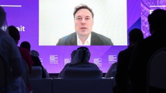 Elon Musk, chief executive officer of Tesla Inc., speaks via video link during the Qatar Economic Forum (QEF) in Doha, Qatar, on Tuesday, June 21, 2022. The second annual Qatar Economic Forum convenes global business leaders and heads of state to tackle some of the world's most pressing challenges, through the lens of the Middle East.