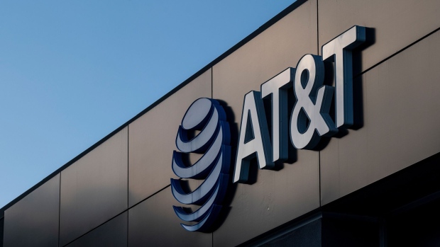 Signage on an AT&T store in Daly City, California, U.S., on Monday, Jan. 25, 2021. AT&T Inc. is expected to release earnings figures on January 27. Photographer: David Paul Morris/Bloomberg