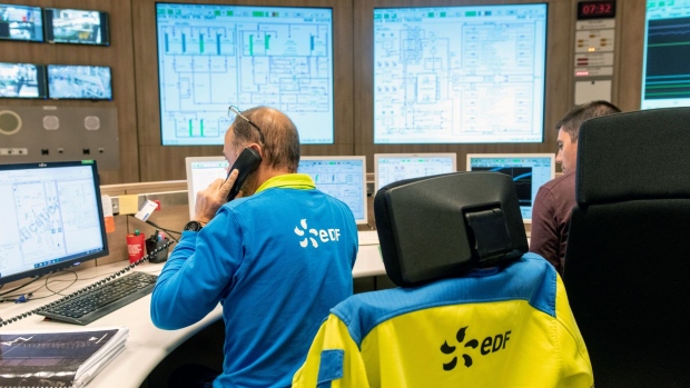 An employee works in the control room during a media tour of the Flamanville 3 reactor at the Evolutionary Power Reactor (EPR) nuclear power plant, operated by Electricite de France SA (EDF), in Flamanville, France, on Tuesday, June 14, 2022. Despite the delays at Flamanville, President Emmanuel Macron has insisted France needs new reactors to replace some of EDF's aging units and cope with an expected boom in clean-energy demand.