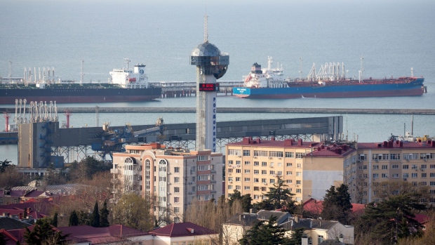 A tanker sits moored dockside at the port, operated by Tuapse Commercial Sea Port JSC, in Tuapse, Russia, on Monday, March 23, 2020. Major oil currencies have fallen much more this month following the plunge in Brent crude prices to less than $30 a barrel, with Russia’s ruble down by 15%.