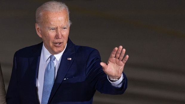 US President Joe Biden waves after arriving on Air Force One at Munich Airport ahead of the Group of Seven (G-7) leaders summit, in Munich, Germany, on Saturday, June 25, 2022. The G-7 leaders hold their summit in the Bavarian Alps starting Sunday hosted by Chancellor Olaf Scholz.