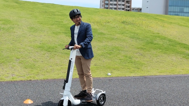 Yotaro Mori, chief executive officer of Striemo rides the company's electric scooter at Honda's R&D center in Wako, Saitama Prefecture, Japan.