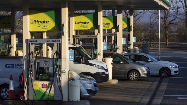 Vehicles refuel at a BP Plc petrol station near Chelmsford, U.K., U.K., on Tuesday, March 8, 2022. U.K. petrol prices rose at the fastest pace in almost 13 years last week as the war in Ukraine sent fuel prices to record highs, government figures show.