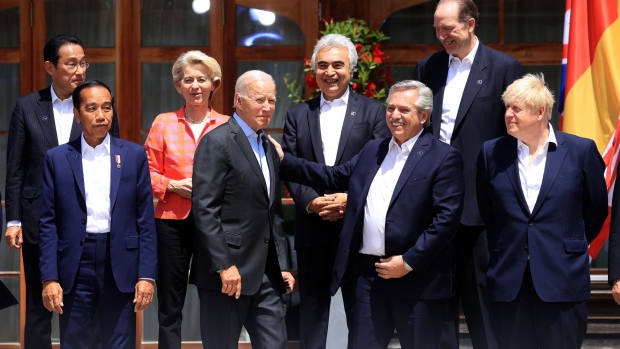 US President Joe Biden, center left, and Alberto Fernandez, Argentina's president, at the 'family' photo on day two of the Group of Seven (G-7) leaders summit at the Schloss Elmau luxury hotel in Elmau, Germany, on Monday, June 27, 2022. G-7 nations are set to announce an effort to pursue a price cap on Russian oil, US officials said, though there is not yet a hard agreement on curbing what is a key source of revenue for Vladimir Putin for his war in Ukraine.