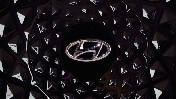 A Hyundai logo on a hubcap at AutoMobility LA ahead of the Los Angeles Auto Show in Los Angeles, California, U.S., on Thursday, Nov. 18, 2021. Covid-19 canceled the Los Angeles Auto Show in 2020 and now that the show is back, some automakers have decided they didn't need it anyway. Photographer: Bing Guan/Bloomberg
