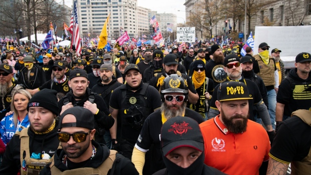 Demonstrators wearing Proud Boys attire gather during the "Million MAGA March" in Washington, D.C., on Dec. 12, 2020. 
