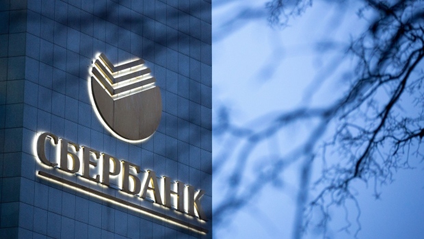 An illuminated logo sits on display at the headquarters of Sberbank PJSC in Moscow, Russia, on Monday, Dec. 23, 2019. Russian lenders may issue over 3.5 trillion rubles ($56 billion) in mortgages in 2020 as rates fall to record lows, Sberbank analysts wrote in a report.